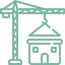 Grúa construyendo una casa